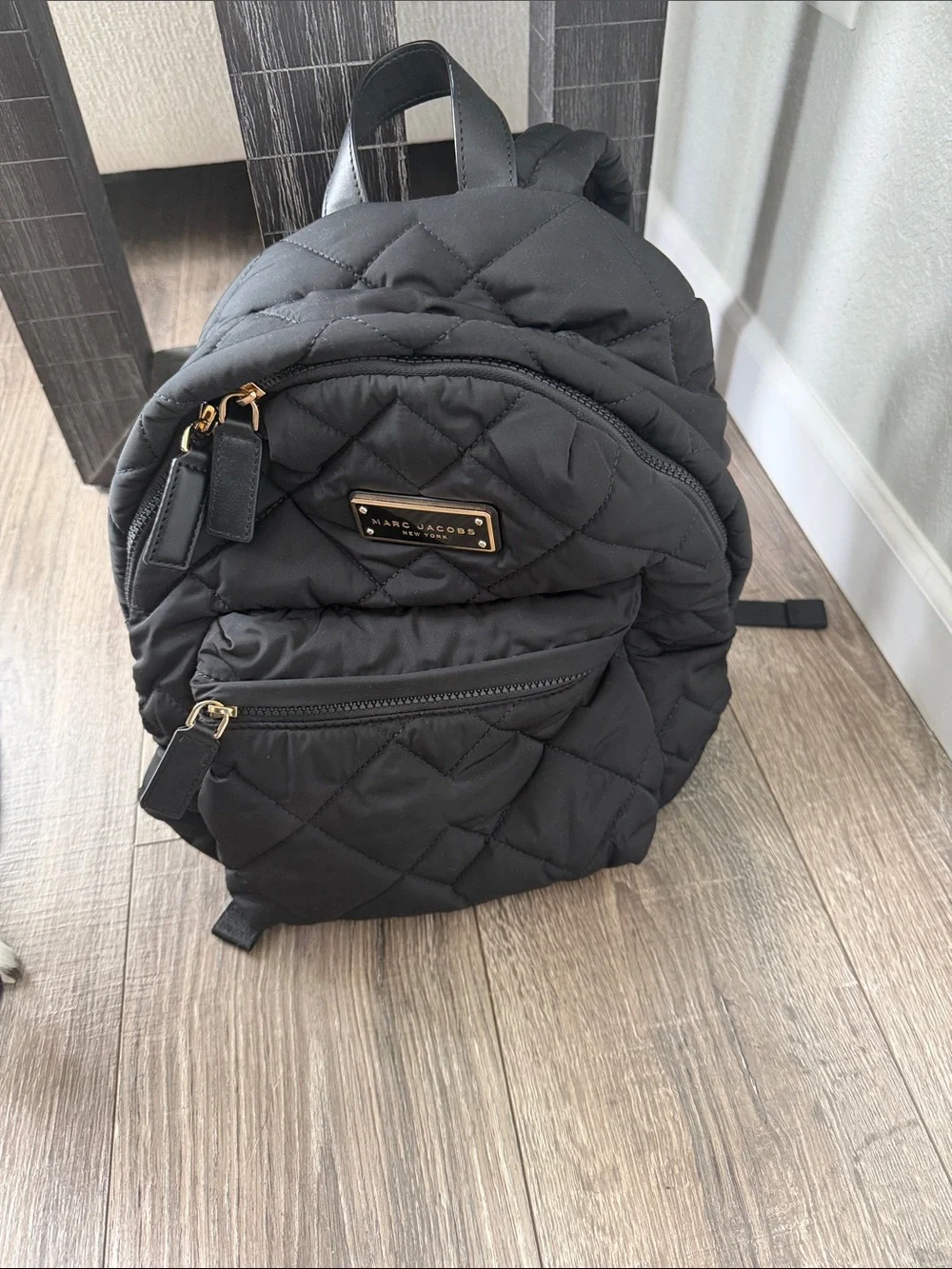 Marc Jacobs Black Quilted Mini Backpack with Gold Plaque